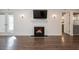 A cozy fireplace becomes the focal point of the living room, offering warmth and ambiance at 1303 Highland Bluff Se Dr # 303, Atlanta, GA 30339