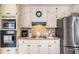 Classic kitchen design with granite counters, modern appliances, and ample storage at 30 Apache Ct, Locust Grove, GA 30248