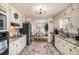This kitchen offers a seamless transition to the dining area, creating an open and inviting space for entertaining at 30 Apache Ct, Locust Grove, GA 30248