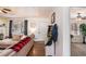 View of the open living room with hardwood floors and access to other rooms at 30 Apache Ct, Locust Grove, GA 30248