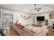 Spacious living room features a fireplace and hardwood floors at 30 Apache Ct, Locust Grove, GA 30248