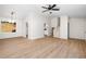 Open-concept living space with hardwood floors and natural light at 5541 Downs Way, Lithonia, GA 30058