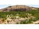 Panoramic view of Stone Mountain Park featuring lush greenery, unique geological formations, and recreational amenities at 5541 Downs Way, Lithonia, GA 30058