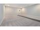 Unfinished basement with neutral carpet and versatile layout for flexible design at 3312 Steeple Chase Sw Way, Conyers, GA 30094