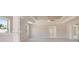 Spacious bedroom with tray ceiling, fan, neutral carpet, and plenty of natural light at 3312 Steeple Chase Sw Way, Conyers, GA 30094
