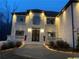 Two-story home with a well manicured lawn and a classic architectural design at 3312 Steeple Chase Sw Way, Conyers, GA 30094