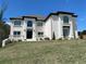 Two-story home with a well manicured lawn and a classic architectural design at 3312 Steeple Chase Sw Way, Conyers, GA 30094