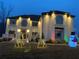 Festive two-story home adorned with colorful holiday lights and decorations at 3312 Steeple Chase Sw Way, Conyers, GA 30094
