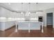Spacious kitchen boasts a large island, custom cabinets, and modern stainless steel appliances at 3312 Steeple Chase Sw Way, Conyers, GA 30094