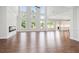 Spacious living room with hardwood floors, fireplace, and lots of natural light at 3312 Steeple Chase Sw Way, Conyers, GA 30094