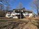 The backyard features a deck, stairs, and a grassy area perfect for outdoor activities and relaxation at 430 N Oakland Cir, Mcdonough, GA 30253