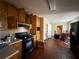 Functional kitchen with ample cabinet space and essential appliances, ready for updates at 430 N Oakland Cir, Mcdonough, GA 30253