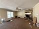 Spacious living room with a stone fireplace and a large window, perfect for gatherings at 430 N Oakland Cir, Mcdonough, GA 30253