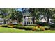 Charming gazebo surrounded by lush landscaping in a picturesque town square setting at 1920 Rosebriar Dr, Marietta, GA 30066