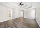 Spacious main bedroom with tray ceilings and hardwood floors at 1920 Rosebriar Dr, Marietta, GA 30066