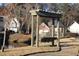 Relaxing view of the bench swing set near the pond, perfect for enjoying the natural surroundings at 1920 Rosebriar Dr, Marietta, GA 30066