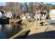 Bench swing set near the pond and gazebo area provides a peaceful escape within the neighborhood at 1920 Rosebriar Dr, Marietta, GA 30066