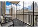 Spacious balcony with chairs and a table and a stunning view of the city skyline at 300 W Peachtree St # 21K, Atlanta, GA 30305