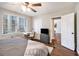 Serene bedroom featuring hardwood floors, a bright window, and a dedicated desk area for work or study at 300 W Peachtree St # 21K, Atlanta, GA 30305
