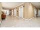 Hallway featuring elevator access and terrazzo flooring at 300 W Peachtree St # 21K, Atlanta, GA 30305