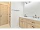 Bathroom featuring a double vanity with natural wood cabinets and modern fixtures at 3119 Blue Heron Pass, Powder Springs, GA 30127