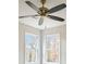 Bedroom features corner windows with beautiful natural light and trees outside at 3119 Blue Heron Pass, Powder Springs, GA 30127
