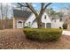 Charming home featuring stone accents, a two-car garage, and mature landscaping at 3119 Blue Heron Pass, Powder Springs, GA 30127