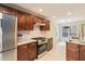 Modern kitchen with stainless appliances, a gas stove and oven, and a light-filled breakfast nook at 3119 Blue Heron Pass, Powder Springs, GA 30127