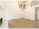 Bright, open living room with hardwood floors, fireplace, and lofted area at 3119 Blue Heron Pass, Powder Springs, GA 30127