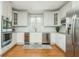 Modern kitchen with stainless steel appliances, white cabinets, and subway tile backsplash at 3718 Thunder Ne Way, Marietta, GA 30066