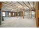 Unfinished basement area, showcasing the framed structure and ample space at 407 Trotters Run, Woodstock, GA 30188