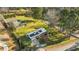 Aerial shot of home with gray siding, lush lawn, and wooded area at 5320 Karr Rd, Cumming, GA 30040