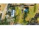 Aerial view of property featuring modern home, detached garage, and large yard at 5320 Karr Rd, Cumming, GA 30040