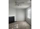 Bright living room showcasing a fireplace, large window, plush carpet, and neutral color palette at 5626 Pine Gate Dr, Atlanta, GA 30349