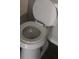 Close-up of a clean, white porcelain toilet with the lid open at 5626 Pine Gate Dr, Atlanta, GA 30349