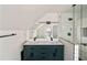 Beautifully renovated bathroom with dual sink vanity, modern fixtures, and glass enclosed shower at 1140 Goodwin Ne Pl, Atlanta, GA 30319