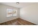 Bright bedroom with wood floors and natural light from windows with blinds at 1140 Goodwin Ne Pl, Atlanta, GA 30319