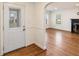 Bright entryway with hardwood floors and an arched doorway leading to the main living space at 1140 Goodwin Ne Pl, Atlanta, GA 30319