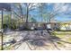 View of backyard with brick patio, table and chairs, and privacy fence at 2754 Drew Valley Ne Rd, Atlanta, GA 30319