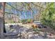 View of backyard with table, chairs, grill, shed, and privacy fence at 2754 Drew Valley Ne Rd, Atlanta, GA 30319