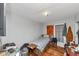 This bedroom has gray walls, hardwood flooring and a single bed; it's also littered with items at 2754 Drew Valley Ne Rd, Atlanta, GA 30319