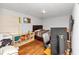 This bedroom has white walls, hardwood floors and a queen-size bed; it's also littered with items at 2754 Drew Valley Ne Rd, Atlanta, GA 30319
