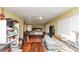 This bedroom has green walls, hardwood floors and a queen-size bed; it's also littered with items at 2754 Drew Valley Ne Rd, Atlanta, GA 30319