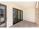 Covered patio with brick flooring and recessed lighting at 334 Olmstead Way # 37, Alpharetta, GA 30022