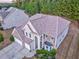 Aerial view of a spacious suburban home with manicured landscaping and a multi-car driveway at 3510 Long Lake Dr, Douglasville, GA 30135