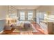 Comfortable bedroom with two windows and ample sunlight at 3510 Long Lake Dr, Douglasville, GA 30135
