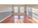 Bedroom featuring hardwood floors and natural light at 3510 Long Lake Dr, Douglasville, GA 30135