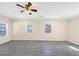 Expansive living room features modern flooring and natural light from several windows at 381 Warner Se, Marietta, GA 30060