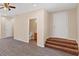 Living room with bathroom access and plush carpet stairs for added comfort at 381 Warner Se, Marietta, GA 30060
