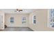 Spacious living room with a ceiling fan and large windows for natural light at 381 Warner Se, Marietta, GA 30060